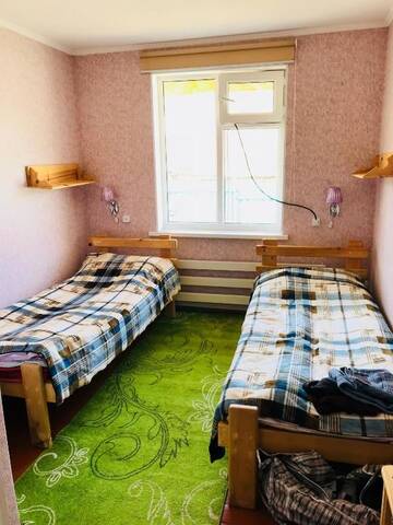 Фото номера Двухместный номер с 2 отдельными кроватями и общим туалетом Гостевой дом Alakol-Jyrgalan Guest House г. Dzhergalan 5