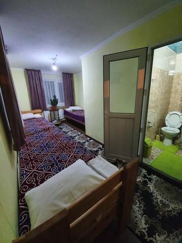 Фото номера Трехместный номер с собственной ванной комнатой Гостевой дом Rahat Guesthouse г. Dzhergalan 4